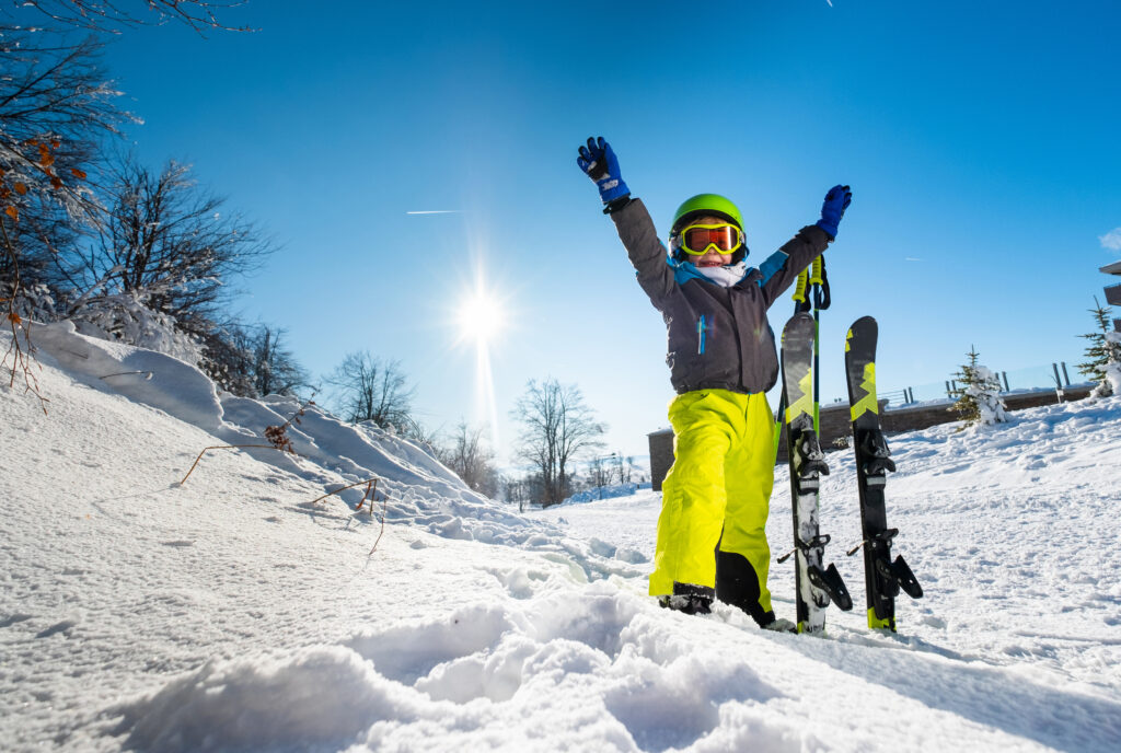 Cute little boy is ready to ski